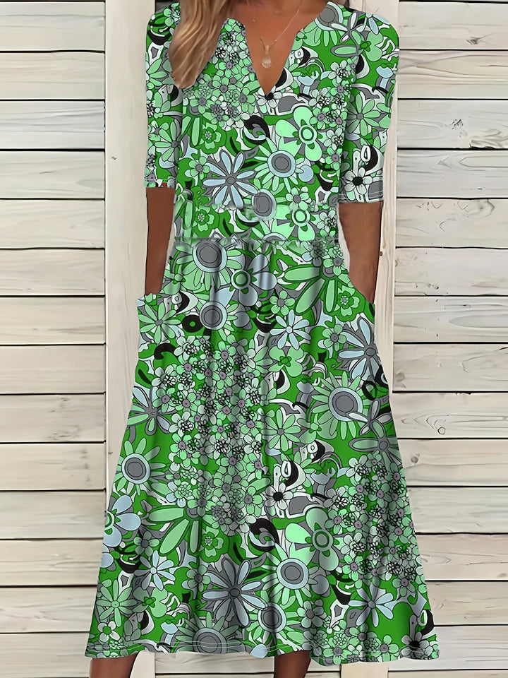 Odette | Robe midi à imprimé floral, décolleté en V et ourlet asymétrique