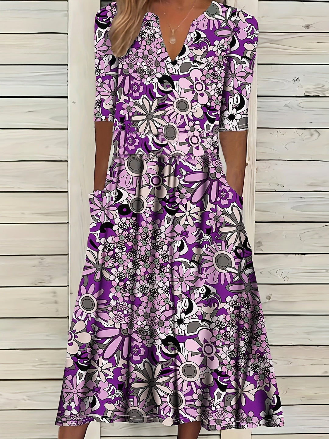 Odette | Robe midi à imprimé floral, décolleté en V et ourlet asymétrique