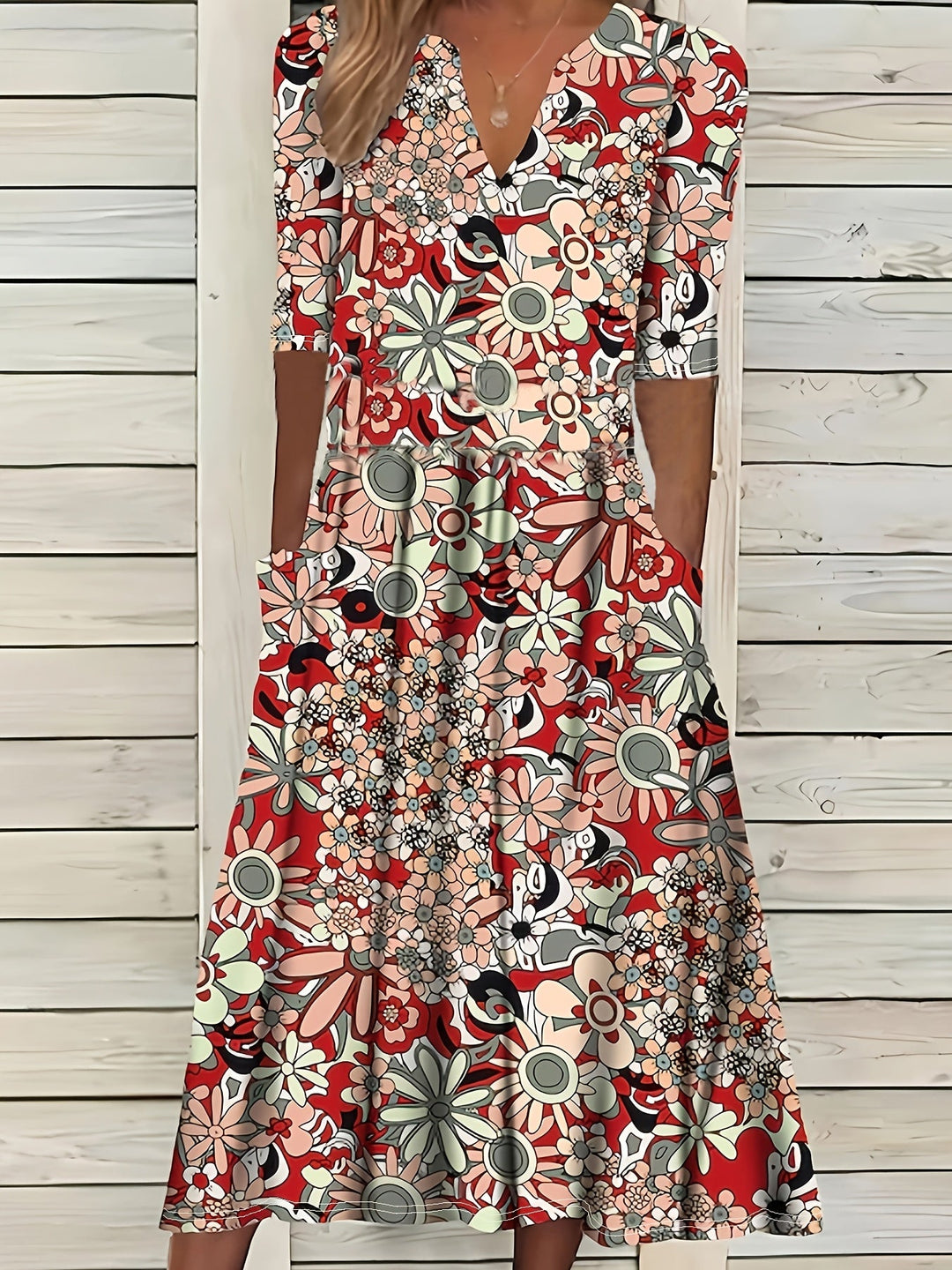 Odette | Robe midi à imprimé floral, décolleté en V et ourlet asymétrique