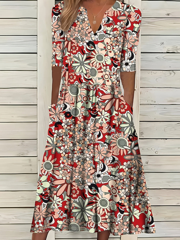 Odette | Robe midi à imprimé floral, décolleté en V et ourlet asymétrique
